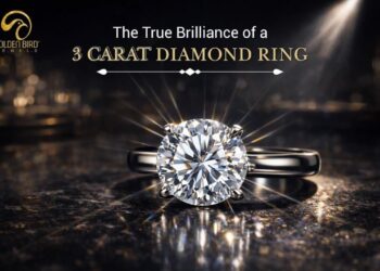 round brilliant diamond engagement ring with sparkling solitaire setting on luxury dark background golden bird jewels